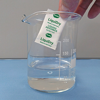 LiquiDry liquids absorber application in a beaker